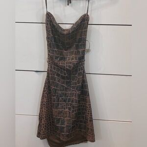 DKNY ultra mini backless dress. This is a vintage piece 1990 right off the run